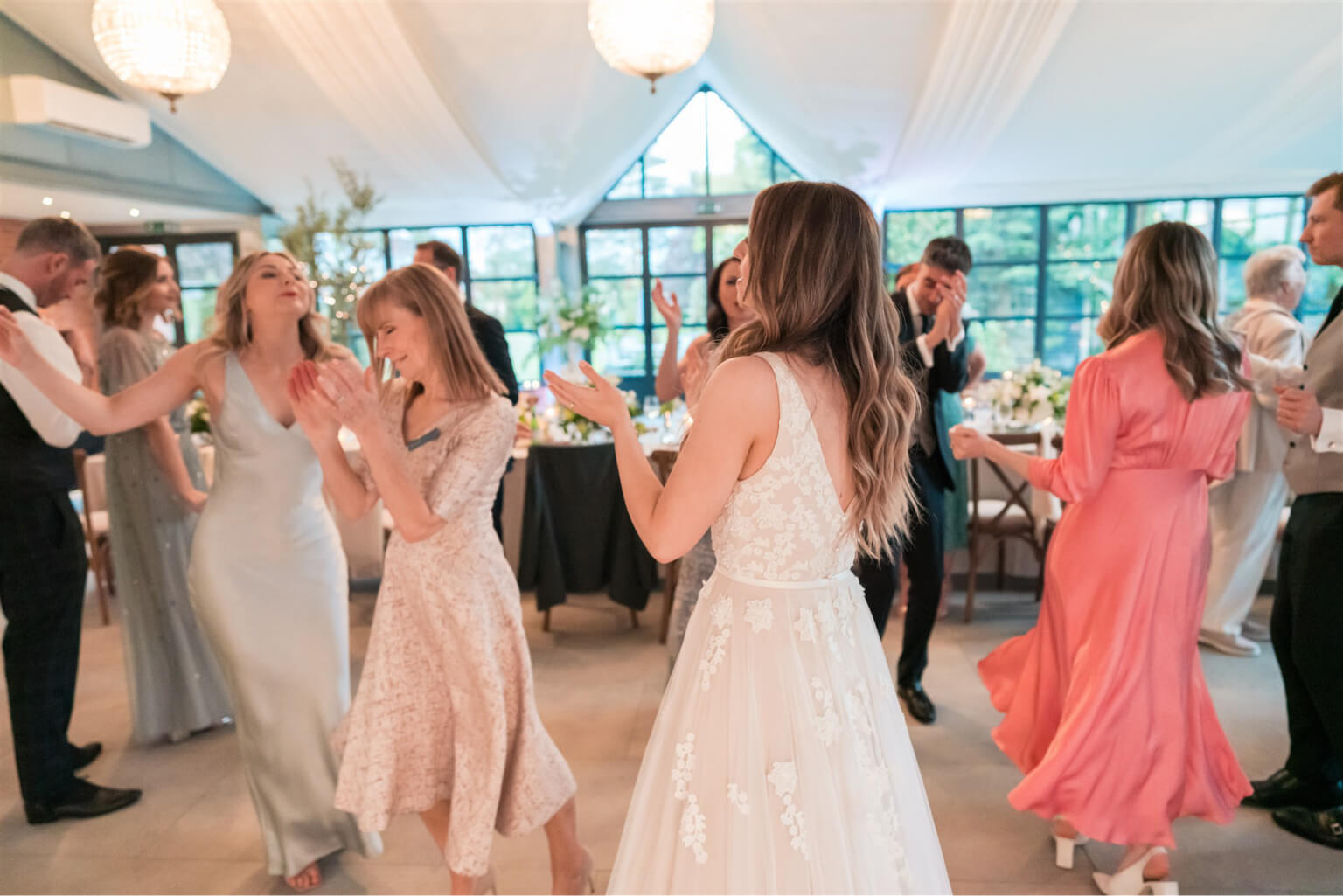 bride dancing at wedding reception in essex