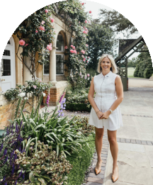 Wedding consultant standing outside Baddow Park House
