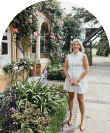 Wedding consultant standing outside Baddow Park House